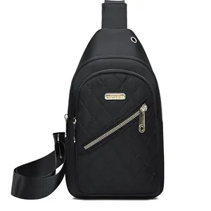 Sleek black quilted nylon chest bag for women with adjustable strap and zip pocket