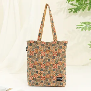 Close-up of bohemian eco-friendly cork tote bag with vintage geometric mandala pattern