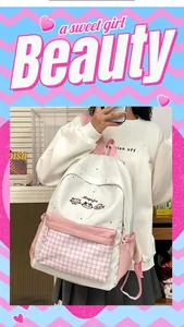 Cute cat embroidered school backpack with pink checkered pocket detail for students