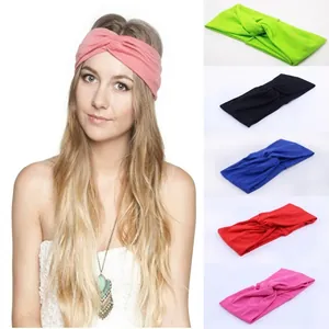 Detailed view of elastic twisted headband in multiple vibrant colors for women