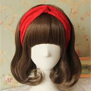 Close-up detail of a vibrant red twisted knot fabric headband displayed on a brown-haired mannequin