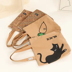 Detailed macro view of eco-friendly cork tote bags with cat and boho patterns in natural tan