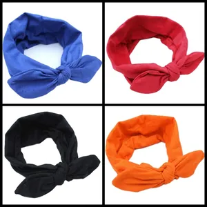 Set of colorful cotton bunny ear headbands in blue, red, black, and orange colors