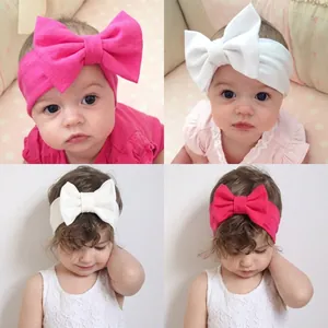 Soft elastic headbands for infant baby girls featuring large oversized bows accessory