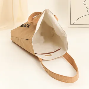 Detail view of the interior space and cork material of the eco-friendly tote bag