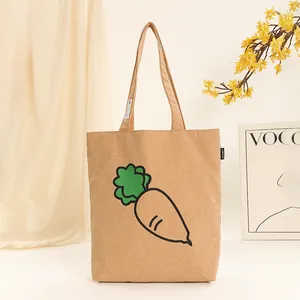 Detailed view of eco-friendly bark cork tote bag featuring a cute cartoon carrot illustration