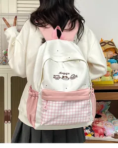 Back view of a cute white and pink embroidered backpack with plaid pocket detail