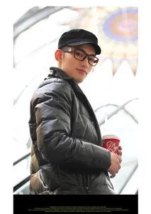 Model wearing black Korean style flat top military cap for urban casual lifestyle