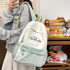 Cute embroidered school backpack with mint green plaid pocket and high capacity