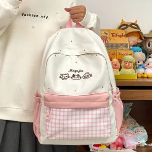 Cute white and pink student backpack featuring cat embroidery and plaid front pocket