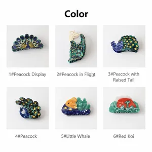Collection of stylish acetate hair claws with peacock and colorful fish animal motifs