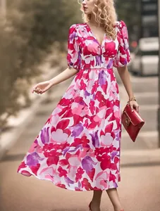Elegant V-neck floral maxi dress with pink prints and cinched waist for summer.