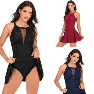 Detailed view of women's one-piece skirt swimsuits in black, burgundy and navy with mesh