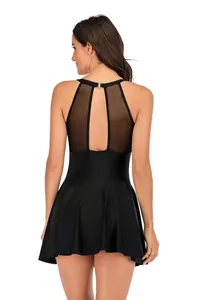 Back view of black one-piece swimsuit with mesh panel and elegant cutout detail