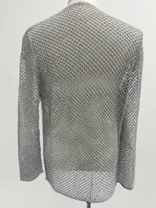 Detail of grey mesh knit sweater showing breathable hollow-out texture