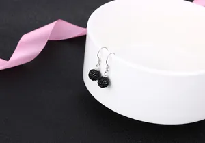 Macro view of S925 silver black crystal ball Shamballa style earrings with fishhook