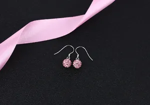 Elegant close-up view of sparkling pink crystal ball drop earrings with S925 silver hooks