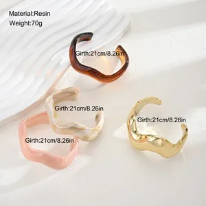 Irregular chunky resin and gold finish open cuff bracelet set, 21cm girth.