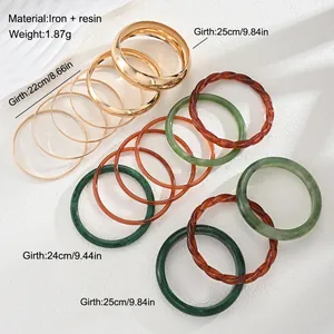 Acrylic and resin bangle bracelet set showing detailed girth sizes and iron material specs.