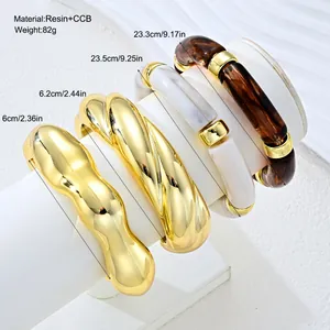 Detailed view of 4pcs irregular resin and gold-tone bracelet set with size measurements