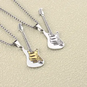 Detailed macro view of two stainless steel electric guitar pendants on metal box chains