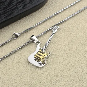 Detail macro view of a stainless steel electric guitar pendant necklace for men hip hop style.