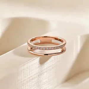 Elegant rose gold stainless steel double-layer hollow ring with micro-pave crystal accents