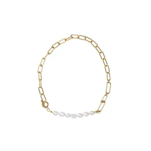 Detailed view of the elegant 18k gold plated titanium chain and white freshwater pearls