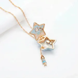 Elegant star-shaped locket necklace featuring miniature bedroom interior and a cute girl charm