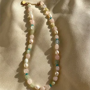 Detail of handmade mixed natural stone and freshwater pearl choker necklace