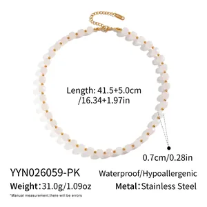 Detailed view of pink natural stone necklace with polished stainless steel bead accents