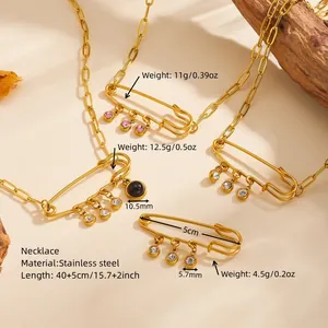 Detailed specifications of a gold safety pin necklace with colorful rhinestones.