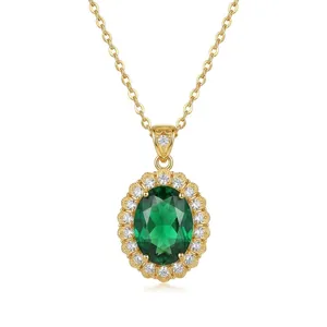Close-up of elegant emerald green zircon pendant on gold titanium steel chain