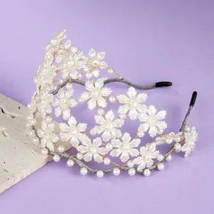Elegant handmade flower and pearl headband tiara for wedding and party hair accessory.