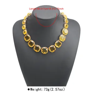 Detailed view of bohemian chunky yellow geometric crystal necklace on mannequin