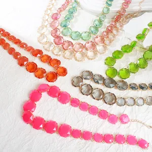 Macro view of colorful Bohemian geometric jelly stone necklaces in several vibrant hues