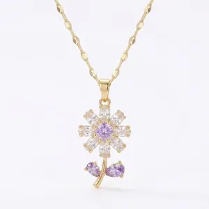 Elegant gold necklace featuring a zircon flower pendant with purple stones and clear accents