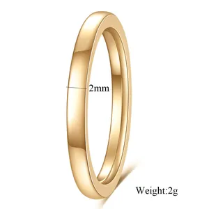 Detailed view of a 2mm wide polished 14K gold plated stainless steel simple band ring.