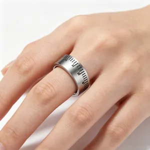 Close-up of industrial style 8mm titanium steel ring with ruler scale design