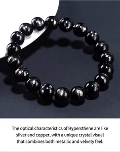 Close-up of natural golden sheen stone bracelet showing unique metallic luster.