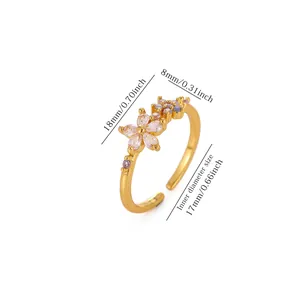Close-up of 18K gold plated flower ring with pink zircons and size annotations