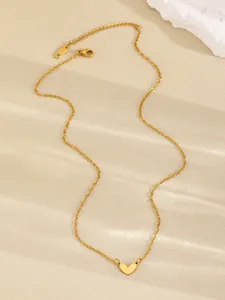 Elegant gold-tone chain necklace with minimalist heart-shaped pendant detail
