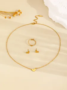Elegant golden jewelry set featuring heart-shaped necklace, ring, and stud earrings