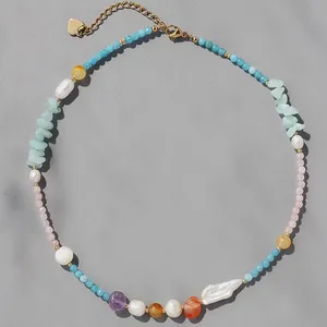 Macro detail of a vintage natural stone beaded necklace featuring freshwater pearls