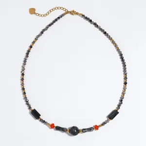 Close-up of vintage natural stone beaded necklace with mixed gemstone accents
