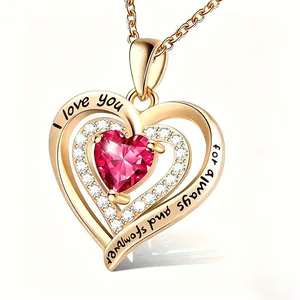 Close-up detail of the heart pendant necklace with pink birthstone and love engraving