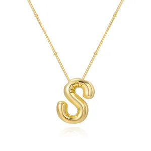 Gold plated bubble letter S pendant necklace with minimalist balloon style
