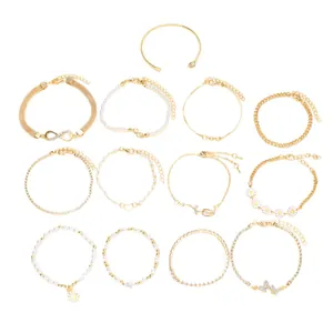 13-piece gold-tone bracelet set with pearls, daisies, and infinity symbols for women