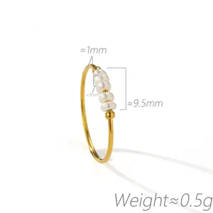 Close-up view of French style pearl ring with 1mm band and 0.5g weight specification