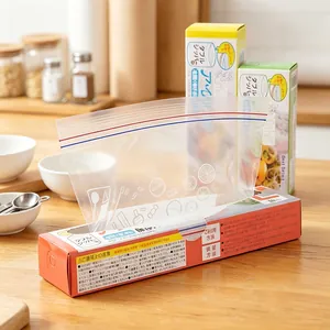 Detail view of thick transparent food seal bags presented in a convenient orange dispenser box